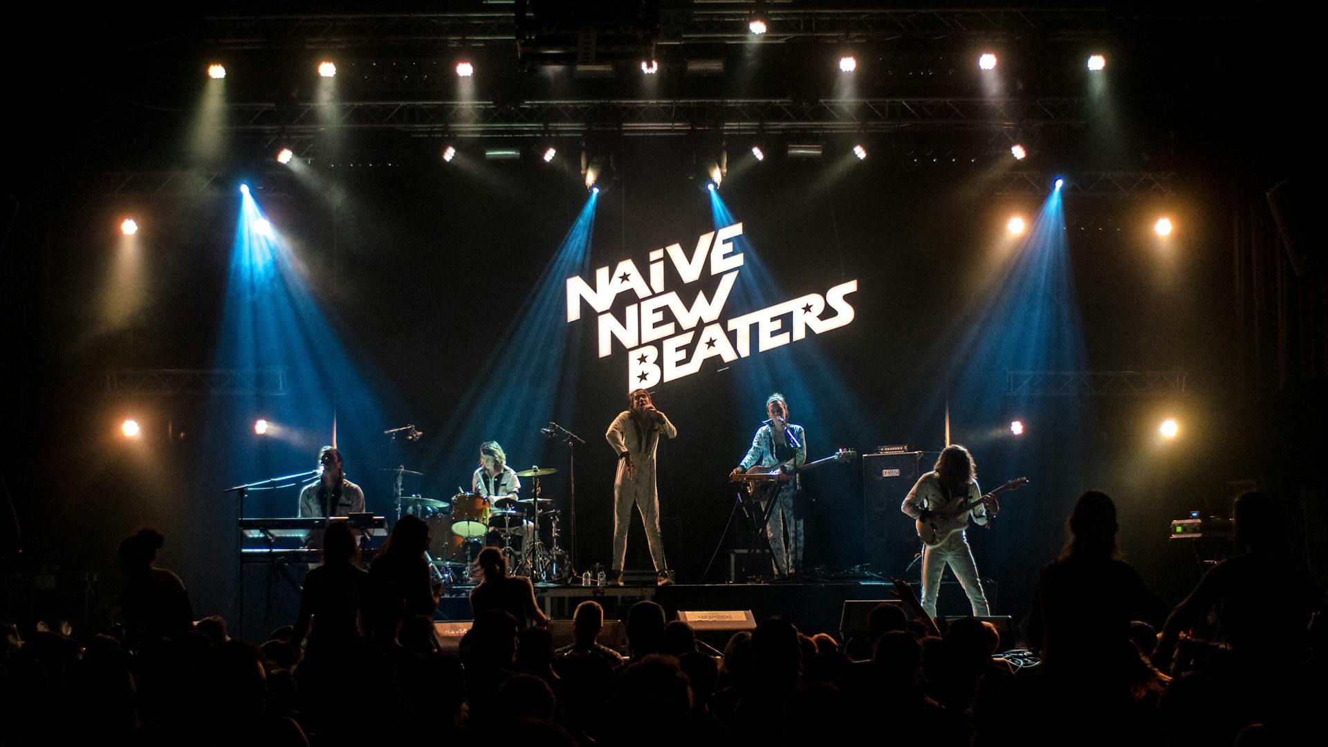 Professional stage with lighting and audio equipment at a live event